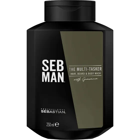 Musta Sebastian Professional The Multi-Tasker 3-in-1 -pesuainepullo valkoisella taustalla. Etiketissä lukee “SEB MAN” ja “The Multi-Tasker Hair, Beard & Body Wash with Guarana”, ja design on kulmikas ja maskuliininen. Pakkaus viestii monikäyttöisyydestä ja käytännöllisyydestä miehille suunnatussa hiusten- ja vartalonhoidossa.